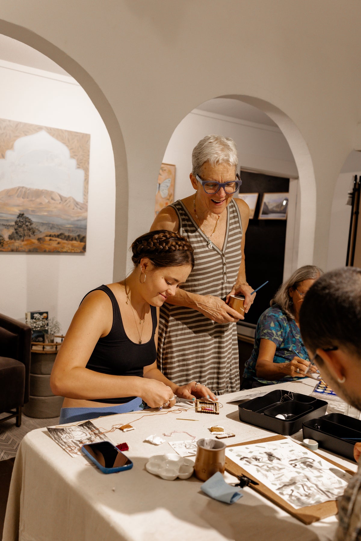 Guests making art at a Creative Social adult art night at Matty Miller Studio in Denver
