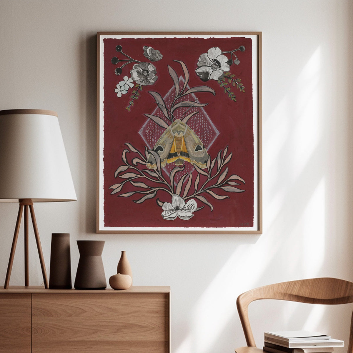 Noctua Pronuba moth artwork by Matty Miller shown in a room