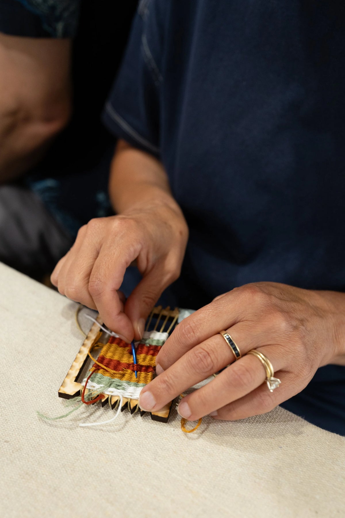 Mini woven necklace made on a frame loom at Matty Miller Studio