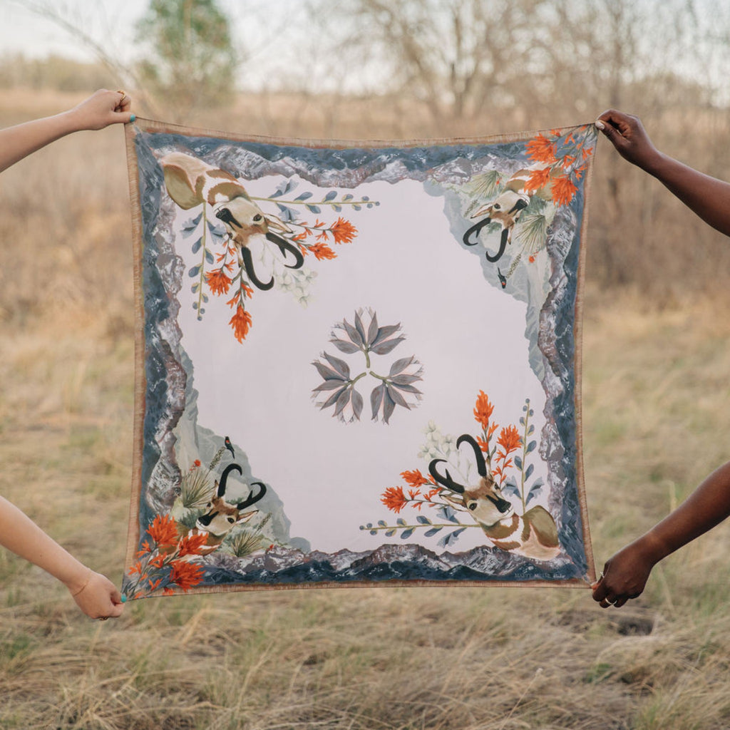 San Luis 100% silk scarf, Landscape Wildlife Floral by Matty Miller, held open outdoors